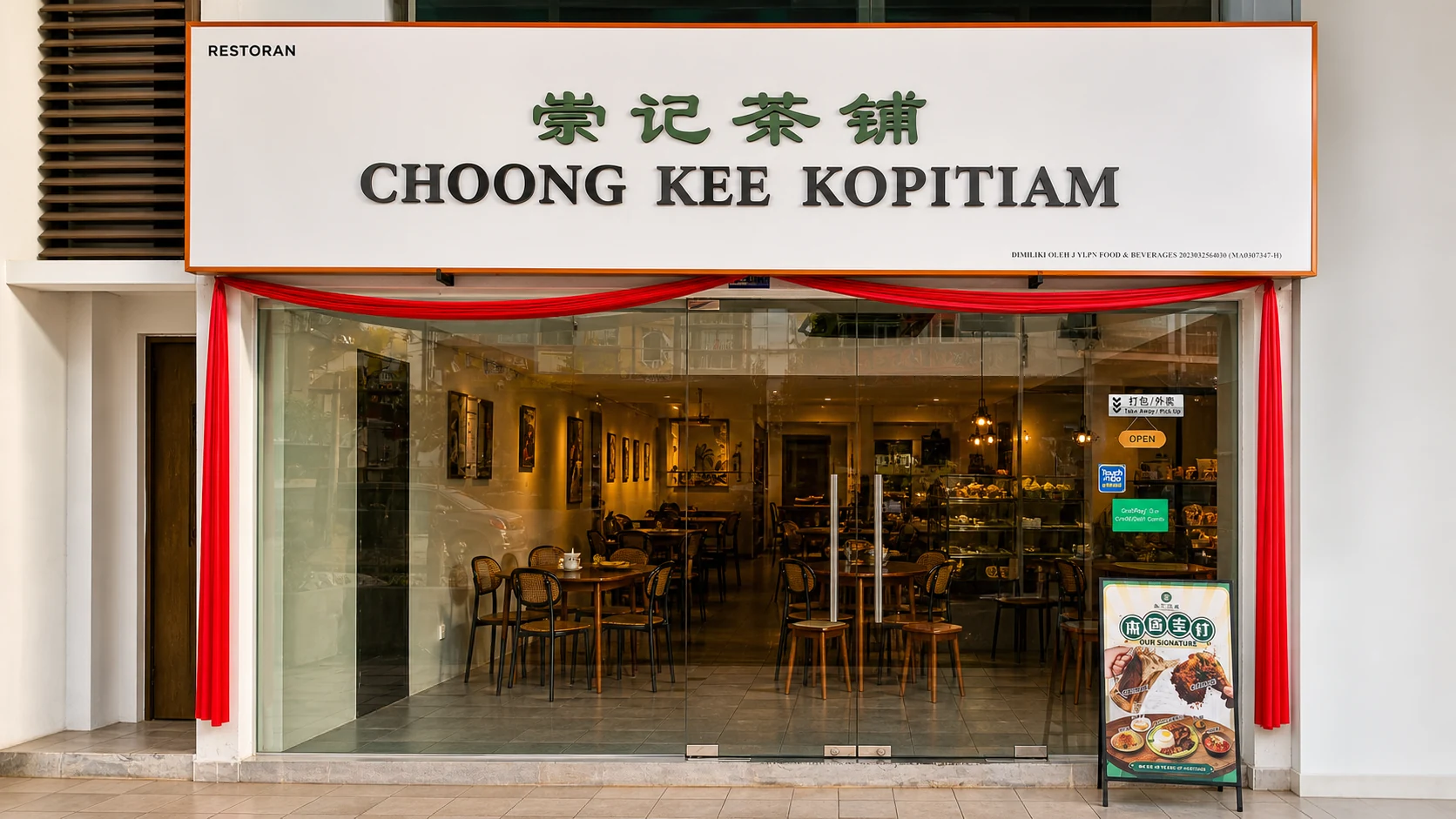 Street-level view of Choong Kee Kopitiam with its bilingual storefront sign